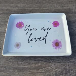 ceramic tray with pressed flowers, glitter, and resin